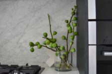 27 fig branches as an alternative to flowers are great for a kitchen