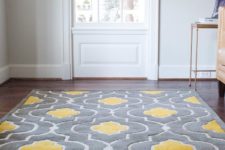 27 grey and yellow rug can help you rock these colors in a living room