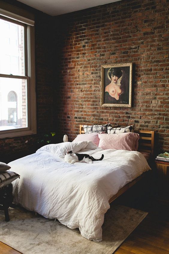 brick wall gives a more masculine feel to the space