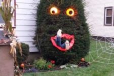 28 people-eating Halloween tree with lighted eyes