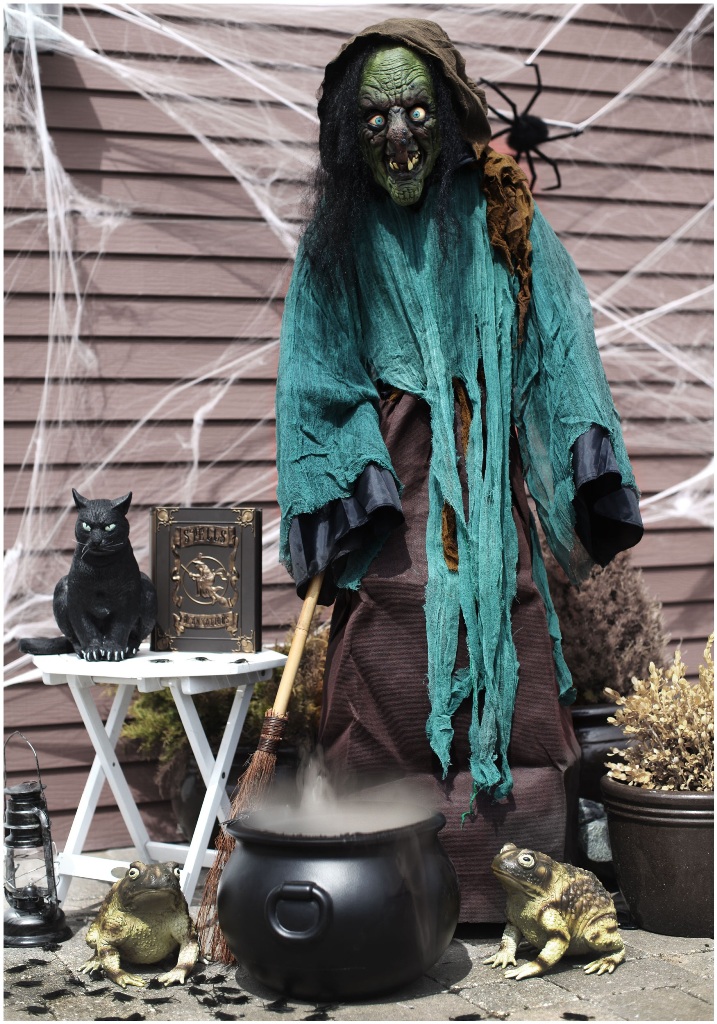 scary faux witch with a black cat is a fantastic indoor and outdoor decoration to pop a Halloween party