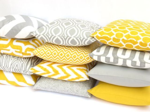 Yellow and grey mix and match pillows are  a cheap way to rock these colors