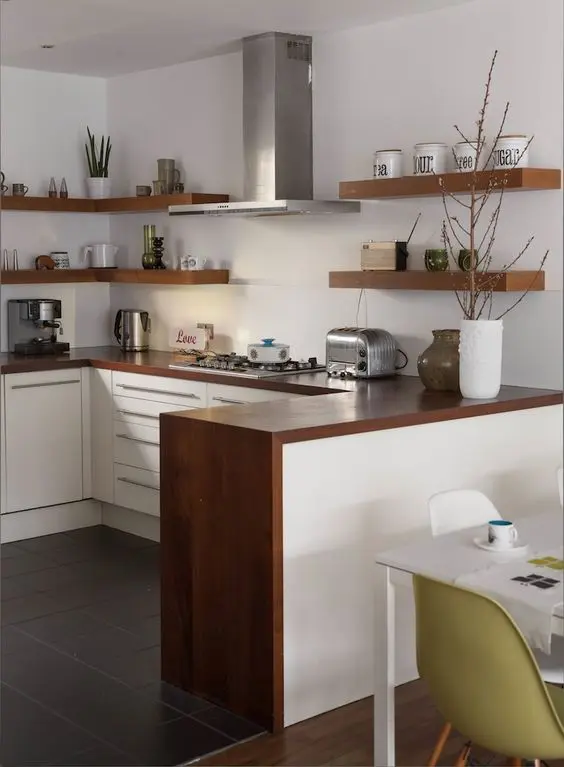 Warm colored wood countertop ties up the whole kitchen decor