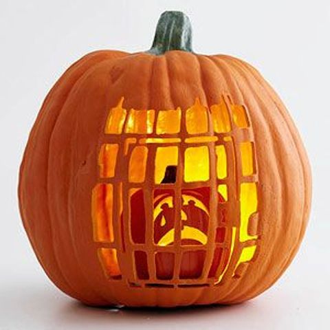 pumpkin cage with a smaller pumpkin inside