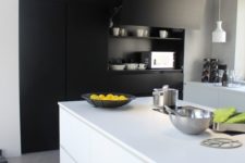 35 sleek matte kitchen with white functional furniture and black storage