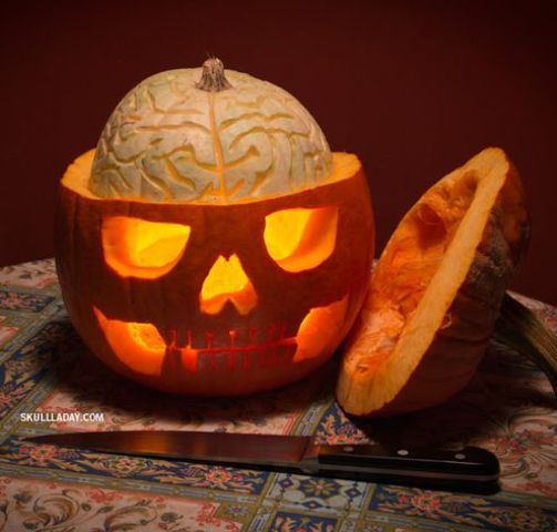pumpkin skull with an exposed squash brain