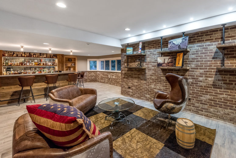 a basement bar would look great with rough walls (DESIGNfirst  Builders)