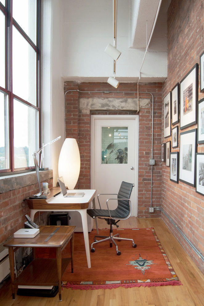 a brick wall is a perfect idea for a loft-style home office