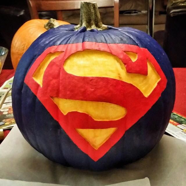 A cool mix of painting and carving can create a beautiful Superman pumpkin