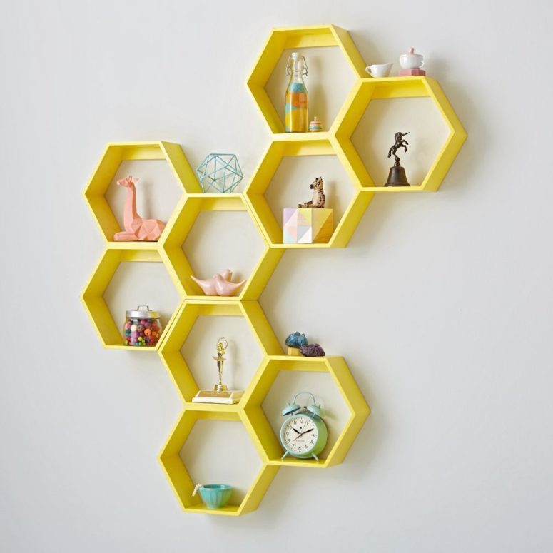 A honeycomb yellow hexagon shelf would look great on a grey wall.