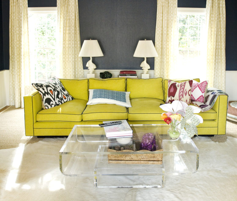 An yellow sofa would make a statement in any grey living room.