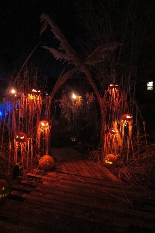 welcome treat or treaters in a really scary way with an arch surrounded by scary jack-o-lanterns