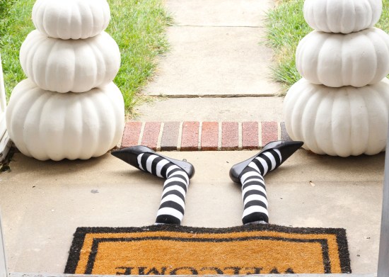 Cute DIY Witch Legs Doormat.
This is an easy project to reuse an old pair of black heels, some striped socks and a bunch of plastic bags.  (via hellocentralavenue.com)