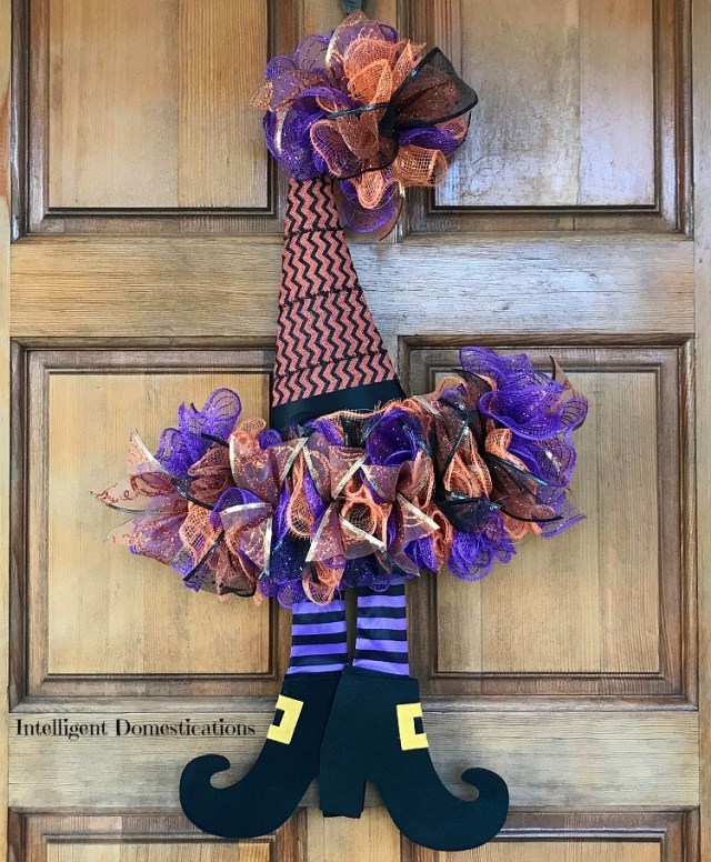 DIY Witch Hat Door Wreath.
Get some dollar store supplies and follow this cool door wreath to add some cuteness to your halloween decor. (via intelligentdomestications.com)