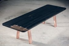 01 Black Patch Match dining tables are created by Alan Dodo and look like they are stitched