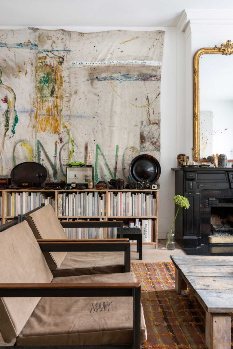 This eclectic home belongs to an artist, and it features a lot of his works and industrial details