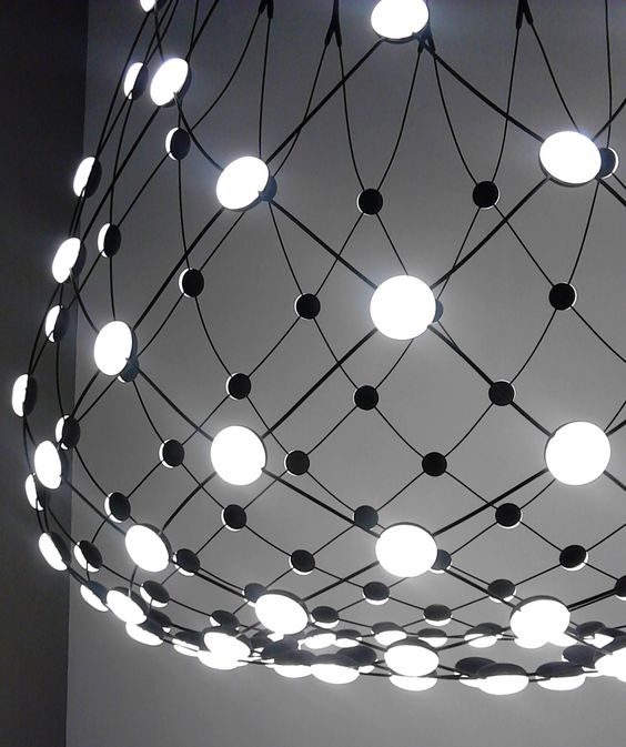 Mesh has unique technological aesthetic, there are metal cables with LEDs on them