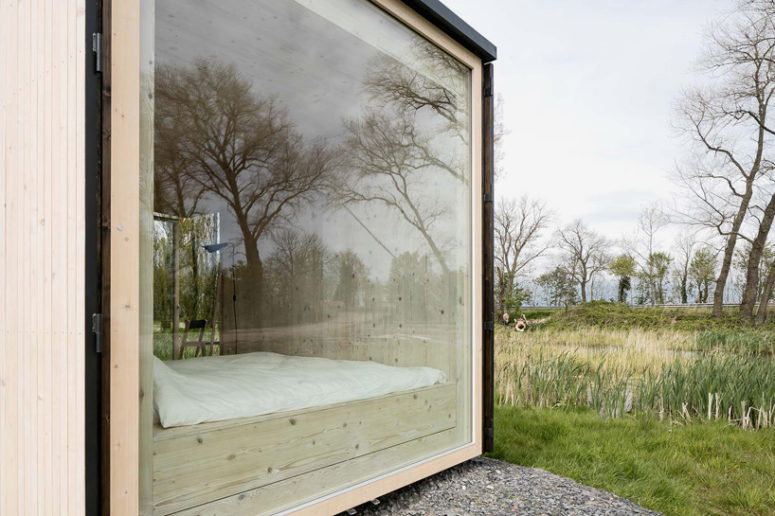 The Ark shelter has a large window, which allows enjoying the views right in a bedroom and brings much light in