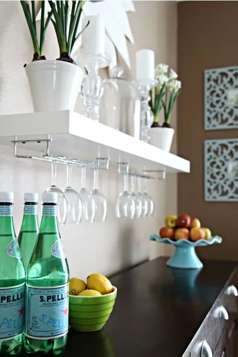a Lack with glass storage underneath is perfect for a home bar
