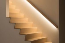 02 hidden lights in the banister lights up the staircase so the owners don’t need any lights while walking up or down