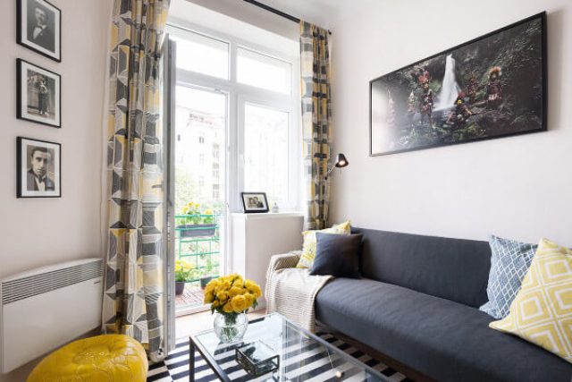 The decor is modern and eye-catchy, with bold yellow and aqua touches and a pallete of soft greys
