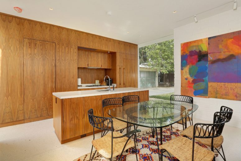 The interiors really show what mid-century modern is, they are full of bold colors and wooden accents