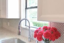 03 add a little texture to your backsplash with white penny tiles and grey grout