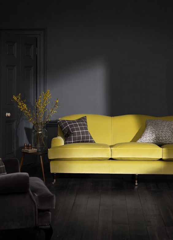 graphite living room with a sunny yellow sofa for an accent