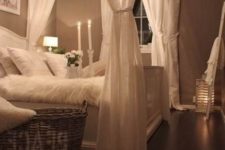 03 shabby chic bedroom with a crystal chandelier and candles for a soft glowing look