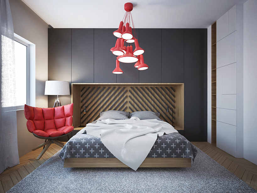 The bedroom is highlighted with red pendant lamps and a soft modern chair