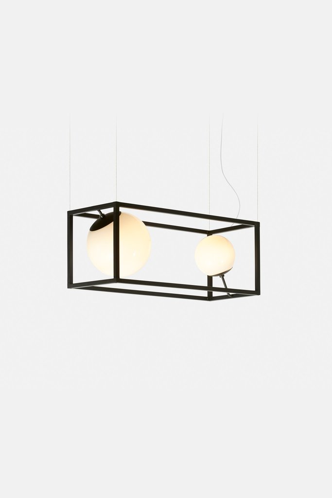 Witt 2 is a lamp that is longer and there are two spheres, it's a fresh take on a traditional chandelier
