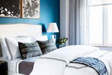 04 bold blue headboard wall makes this peaceful modern bedroom chic
