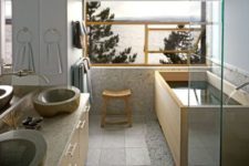 04 light Japanese bathroom with stone sinks, a wooden bathtub, light tiles and stone