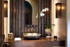 05 darker bathroom style with black bamboo decor, dark woods and hidden lights