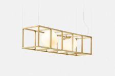 06 Witt 4 is also a modern chandelier available in brass and the cube is different, it has more sides and two spheres
