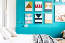 06 enliven your bedroom with a bold turquoise plank wall