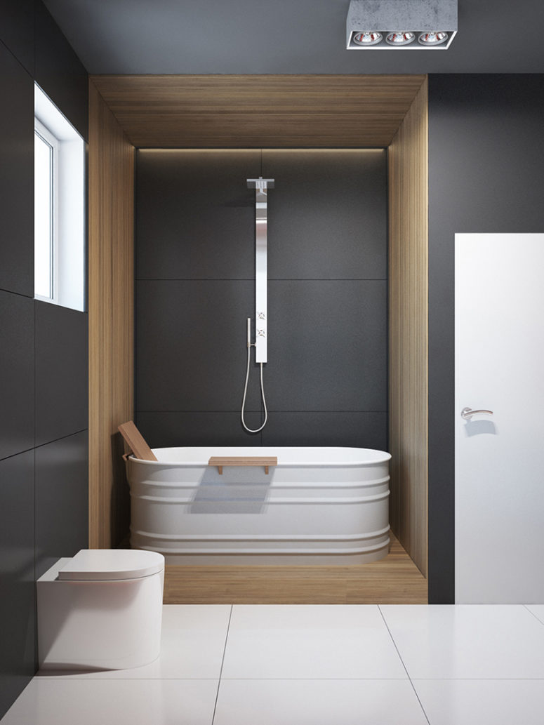 the bathroom is decorated in dark grey with addition of light wood