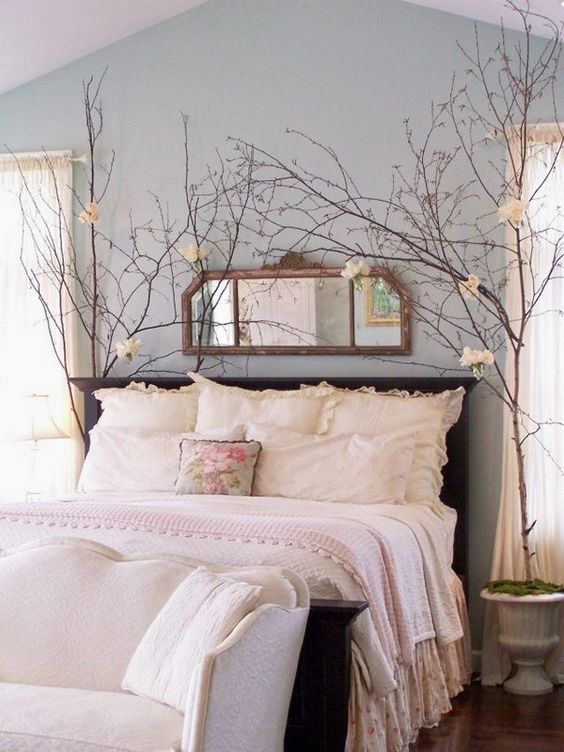 blush bedding with fluffy pillows look inviting