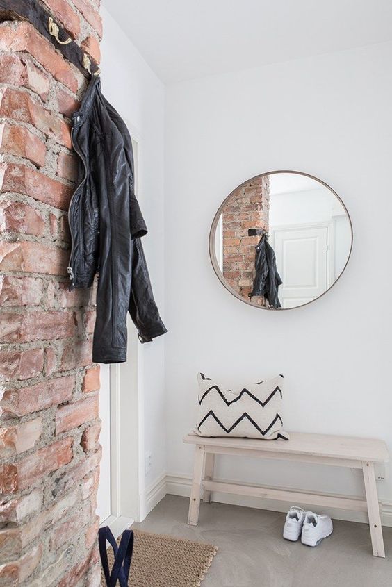 be on-trend with a brick wall that will give a textural look and a bit of style to your entryway