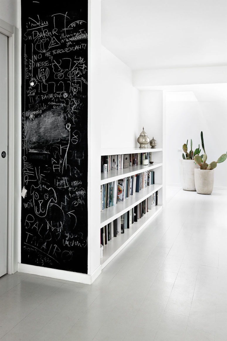 A chalkboard bookshelf side inspires kids' creativity
