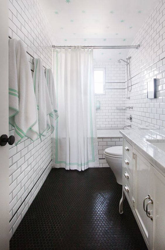 Penny tile floors can create an eye catching texture to spruce up even the simplest decor