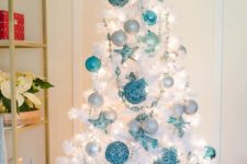 10 pure white trees look amazing with blue ornaments of various shades