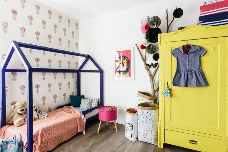 A blue house bed and a sunny yellow wardrobe are amazing