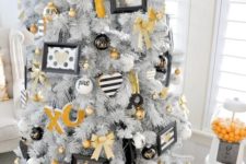 11 white tree with whimsy white, black and gold decor