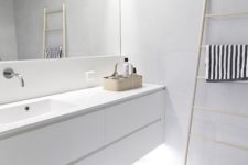 12 fill your white bathroom with light hiding some of them above