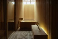 13 bathroom totally clad with light wood with hidden lights look relaxing and a bit mysterious