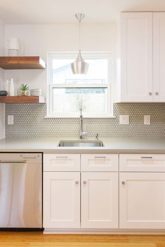 grey hax tiles fit this mid-century modern neutral kitchen perfectly