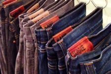 15 organize your jeans, pants and tank tops in the closet using hooks