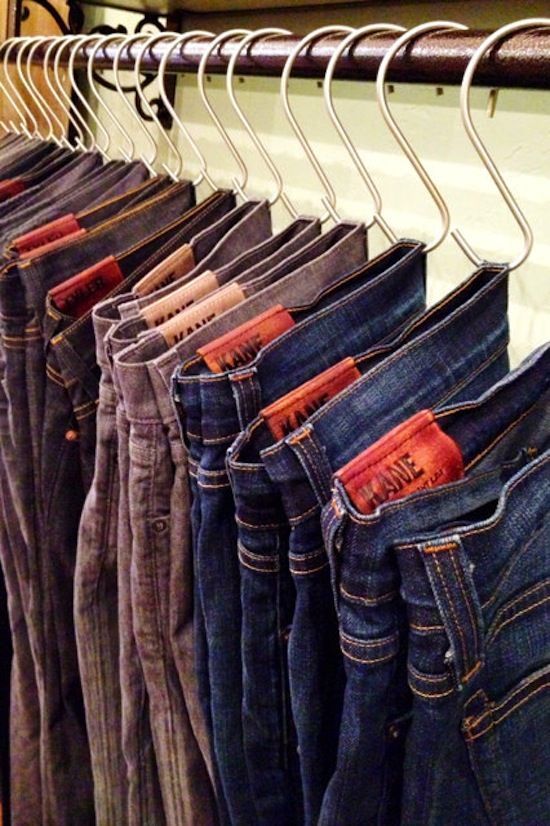 organize your jeans, pants and tank tops in the closet using hooks