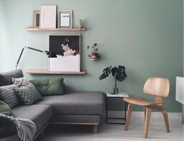 dove grey room, a light green wall and green and grey upholstery